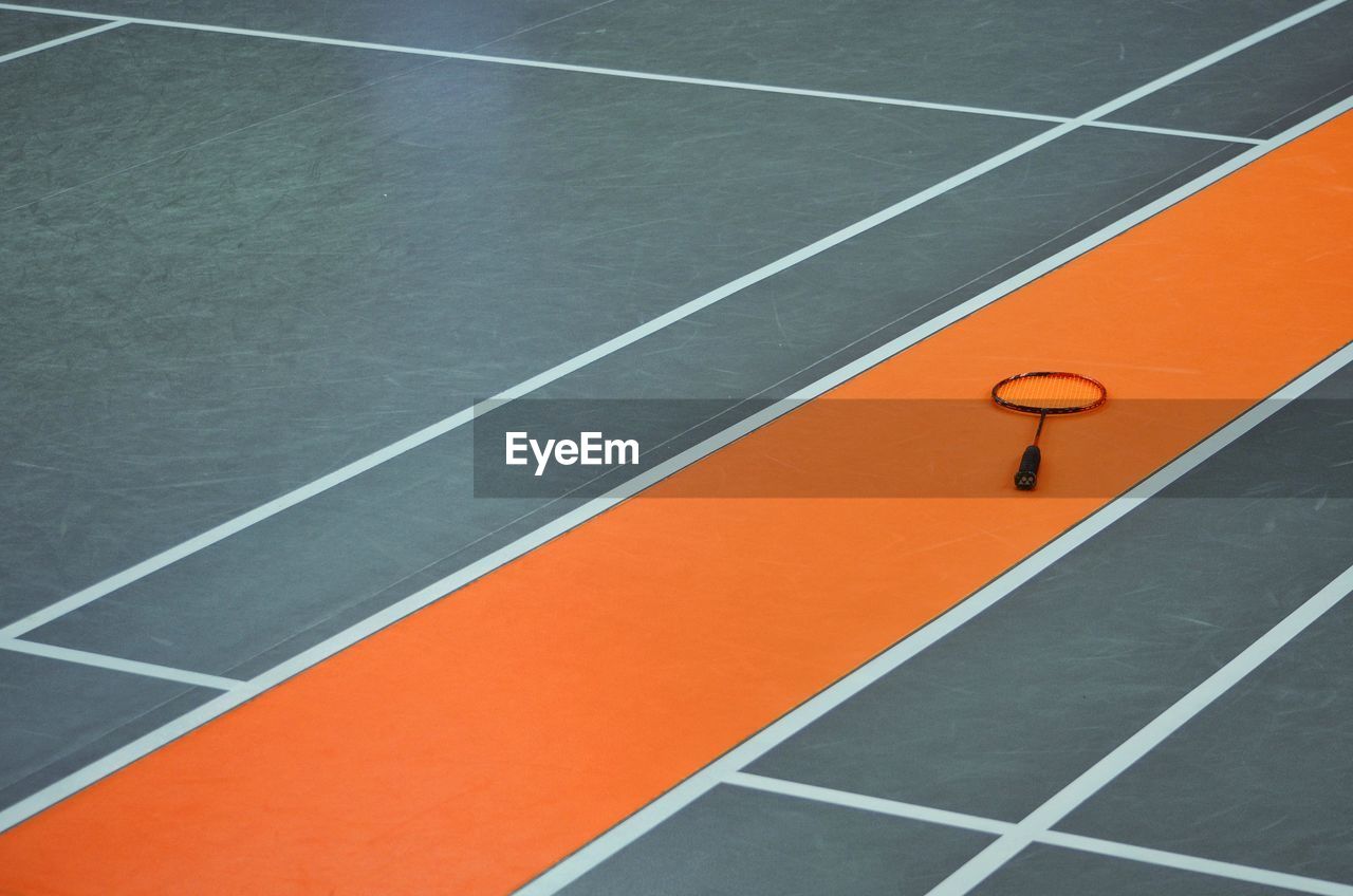 High angle view of badminton racket on floor