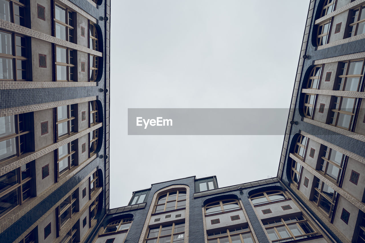 Low angle view of buildings against clear sky