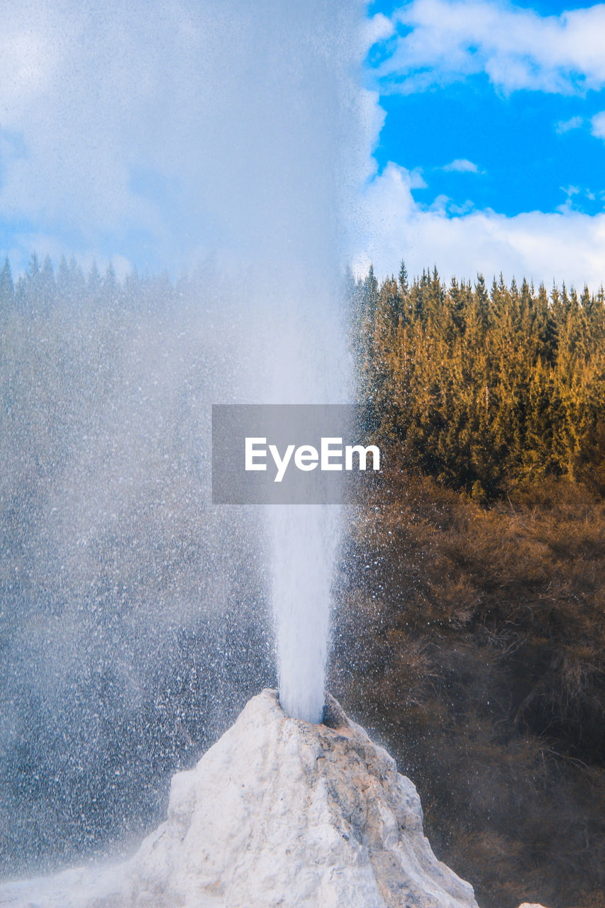 View of water emitting from geyser