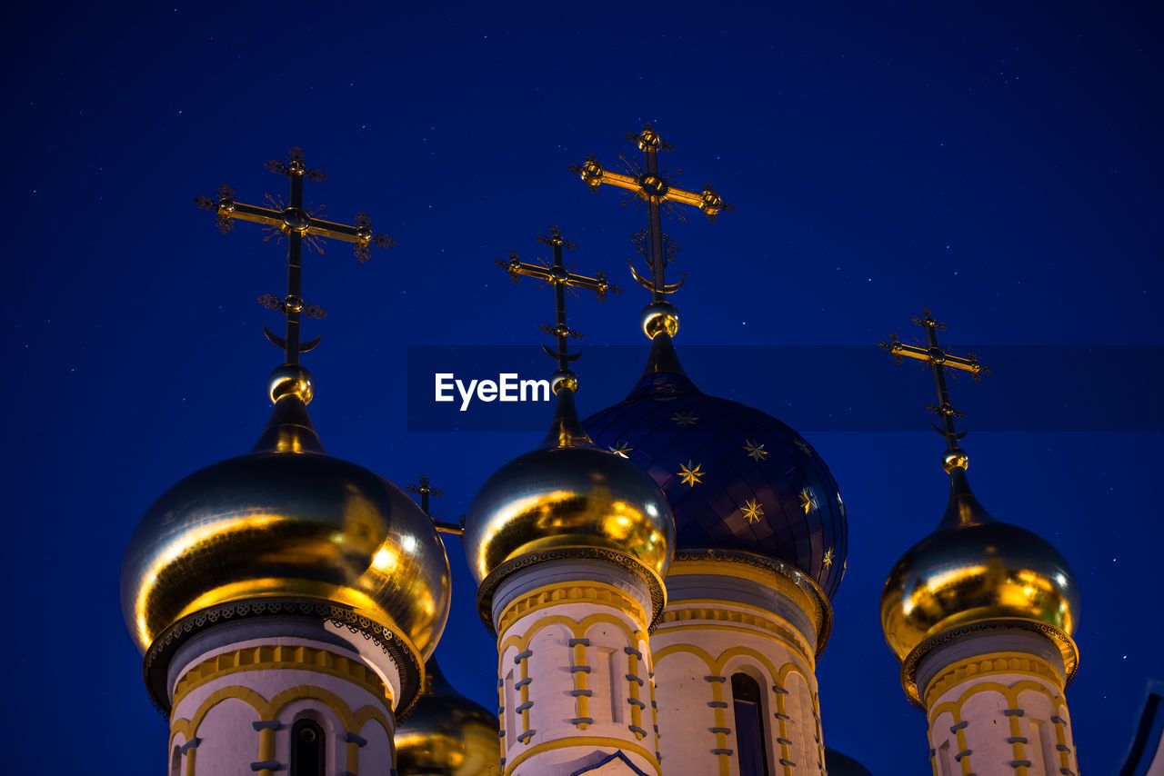 Low angle view of church against sky at night