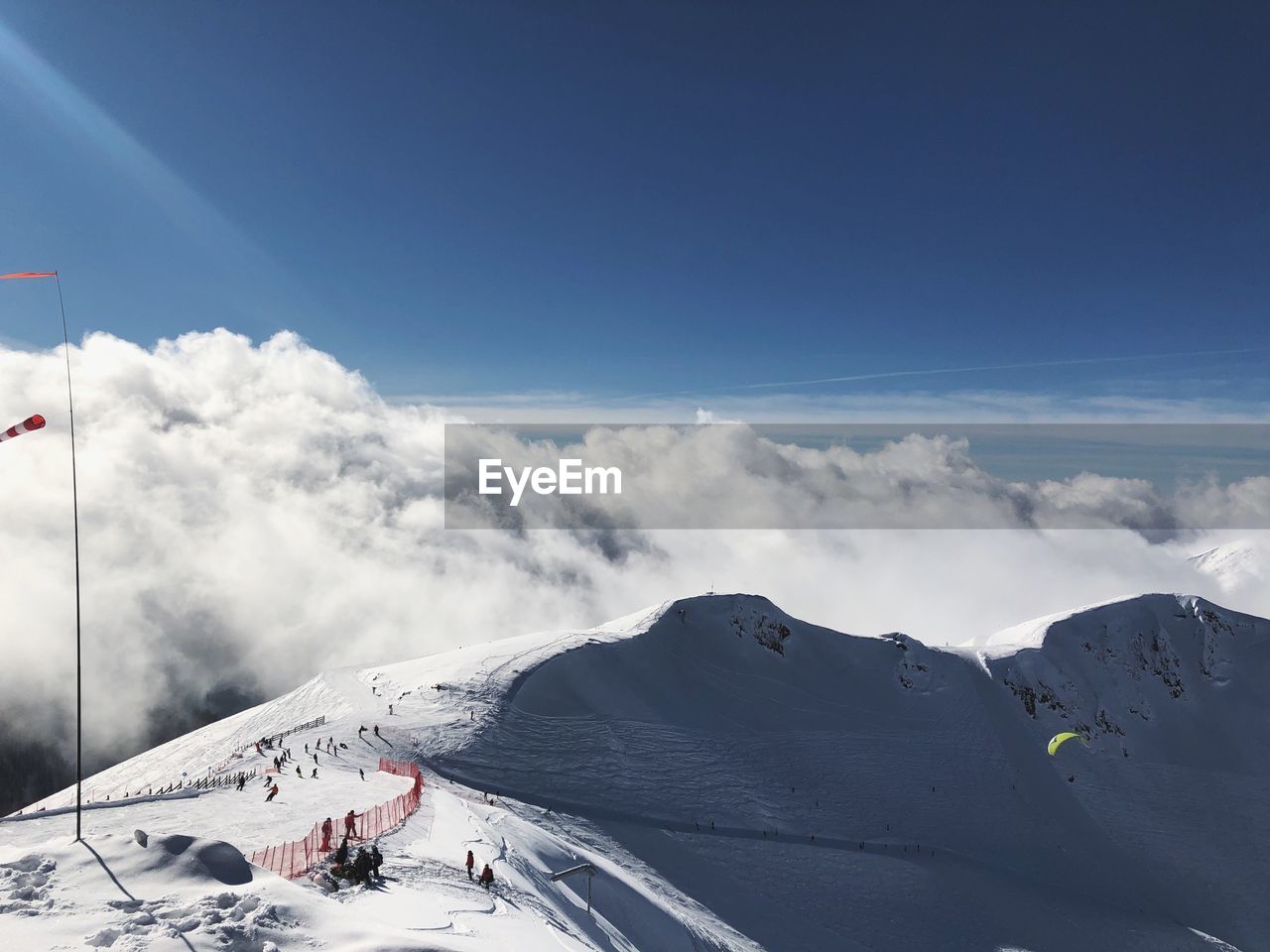 Scenic view of snow covered mountains against sky