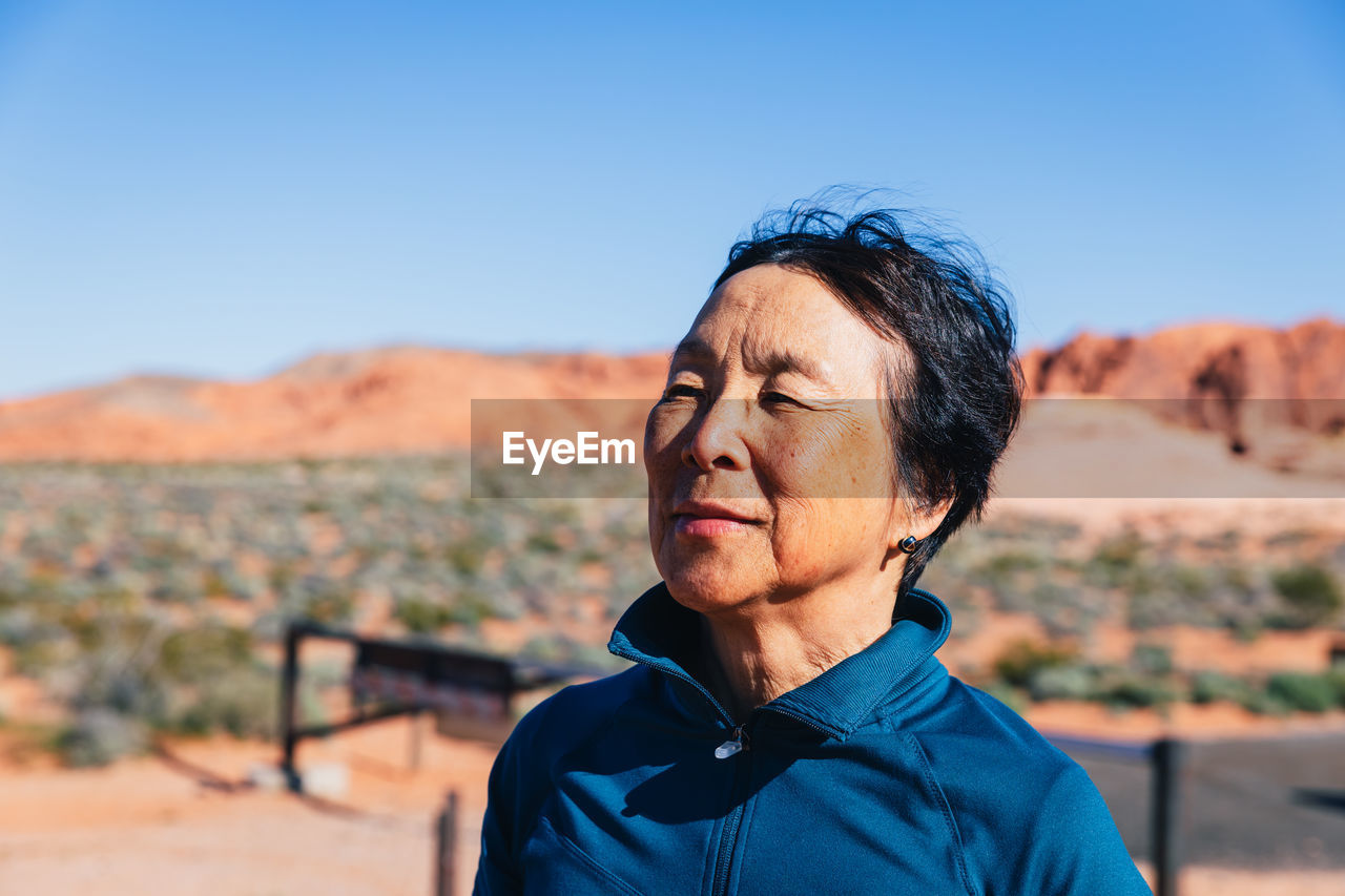 Senior asian woman in the desert