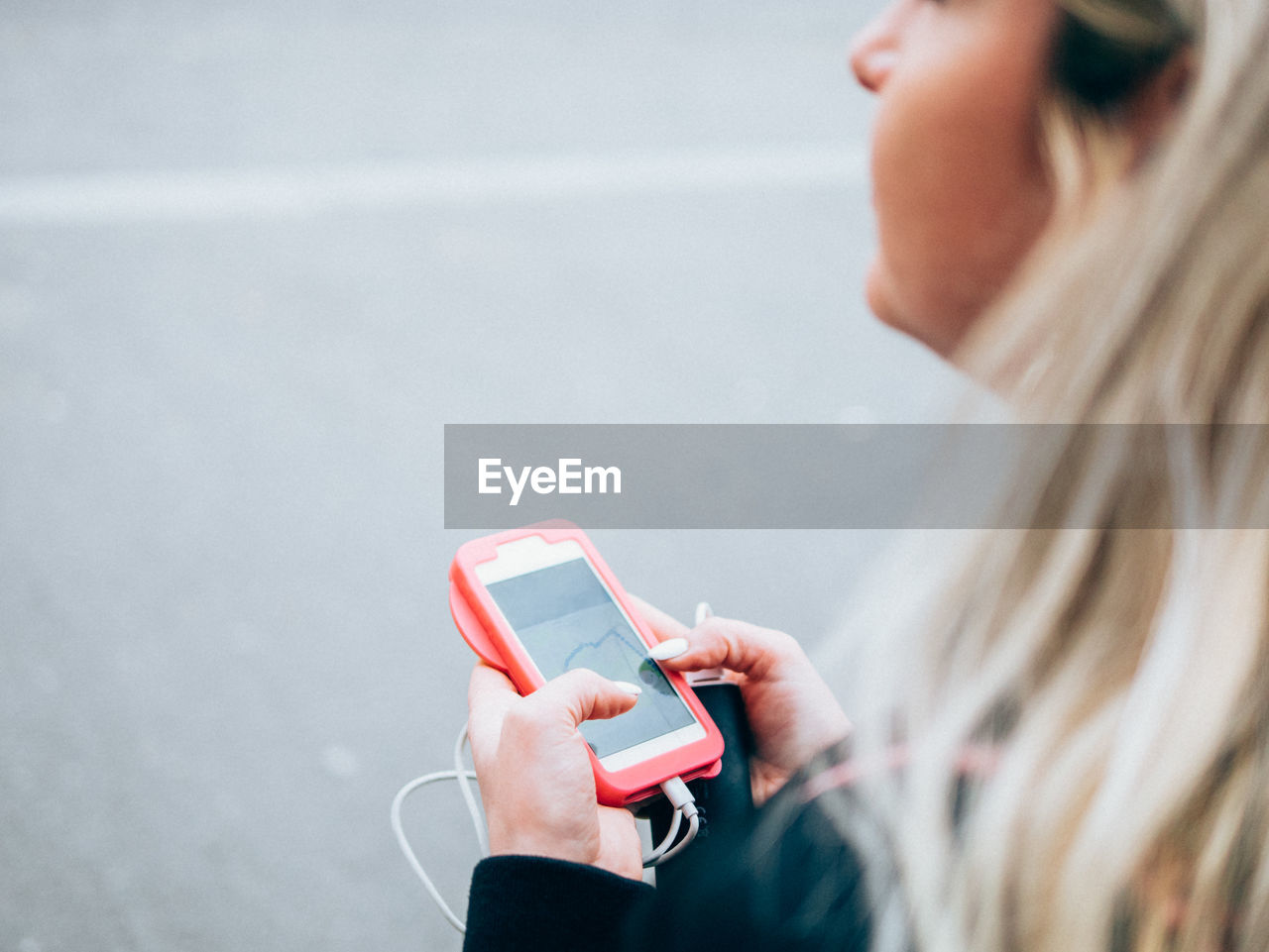 Close-up of woman using mobile phone