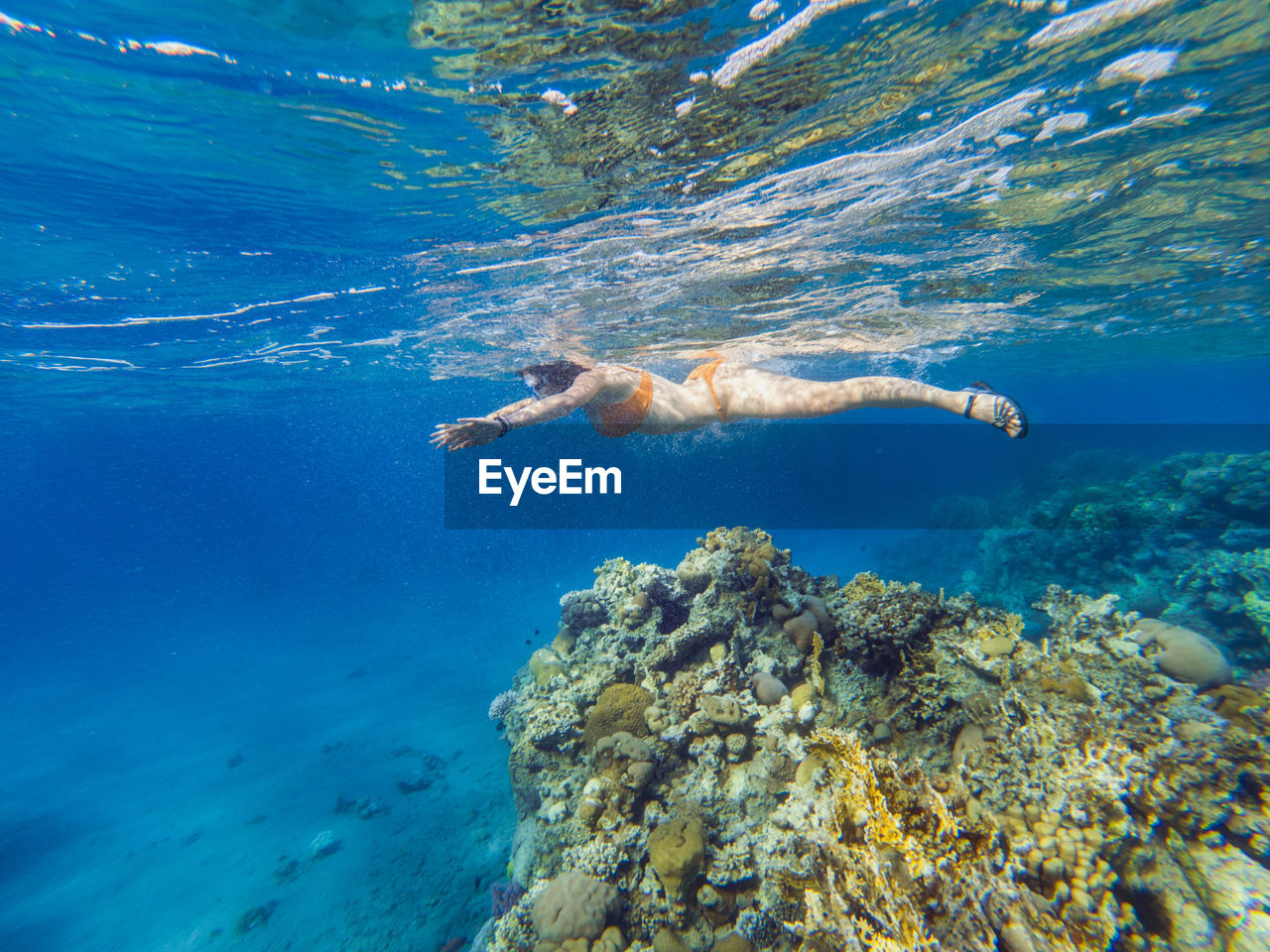 Woman snorkeling in sea