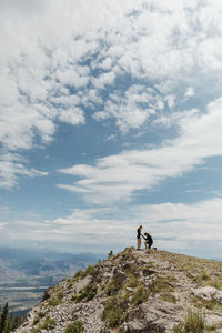 Man gets on one knee to propose to his girlfriend on wyoming mountain