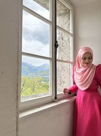 Portrait of muslim girl in hijab and jubah dress in outdoor scenes lifestyle and vacation concept