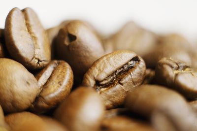 Close-up of coffee beans on table