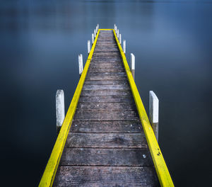Wooden jetty on pier over lake