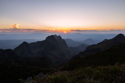 Scenic view of mountains against sky during sunset