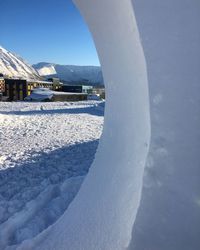 Snow on mountain against sky