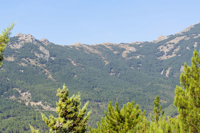 Scenic view of mountains against clear sky