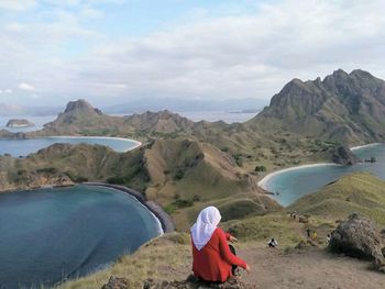 Rear view of woman looking at mountains