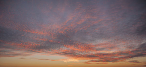 Scenic view of dramatic sky during sunset