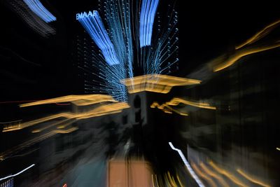 Close-up of light trails against black background