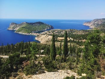 Scenic view of sea against clear blue sky