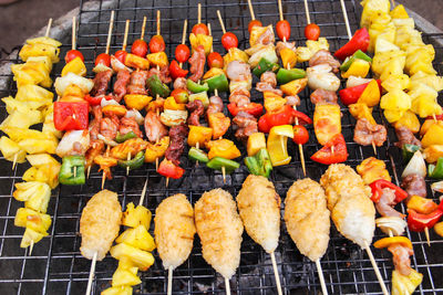 High angle view of vegetables on barbecue grill