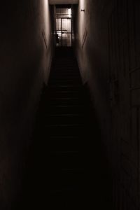 Narrow stairs along walls