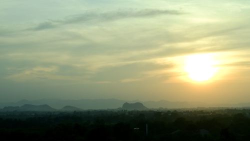 Scenic view of silhouette landscape against sky during sunset