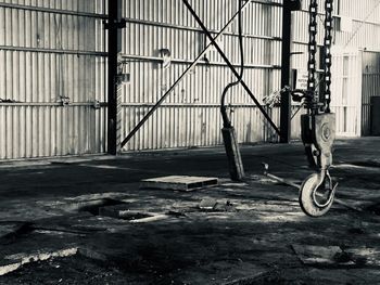 Bicycle on footpath against building