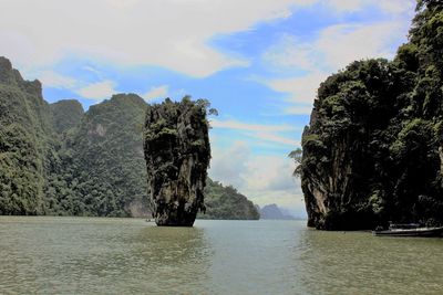 Scenic view of sea against cloudy sky