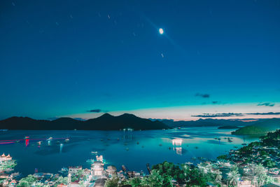 Scenic view of sea against sky at night