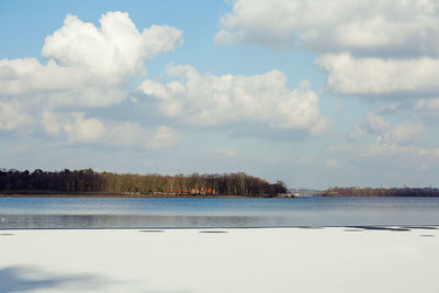 Scenic view of frozen lake against sky