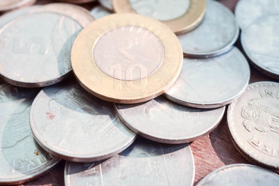 High angle view of coins