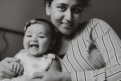 Portrait of mother and daughter