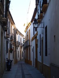 Narrow street amidst buildings in town