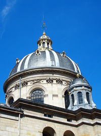 Low angle view of cathedral against clear blue sky