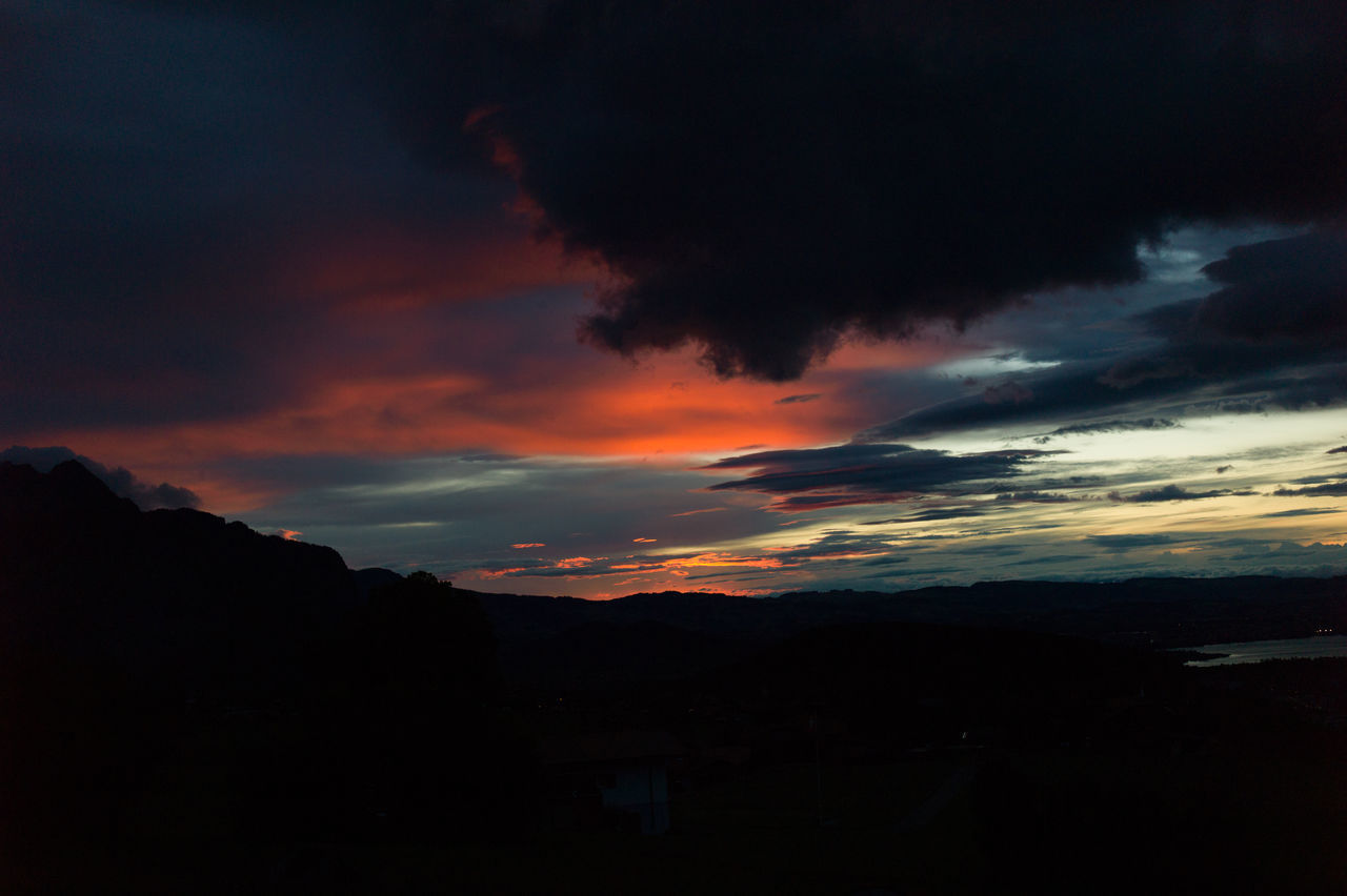 sunset, silhouette, beauty in nature, tranquil scene, sky, tranquility, nature, orange color, scenics, cloud - sky, dramatic sky, no people, outdoors, mountain, day