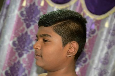 Close-up of boy looking away