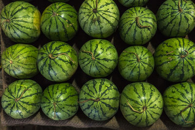 Full frame shot of stacked whole watermelons