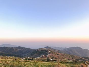 Scenic view of landscape against sky during sunset