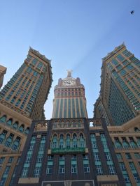 Low angle view of skyscrapers against sky