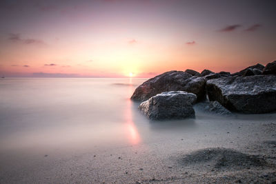 Scenic view of sea against sky during sunset