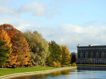 Scenic view of trees against sky during autumn