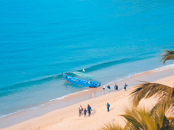 High angle view of people on shore at beach