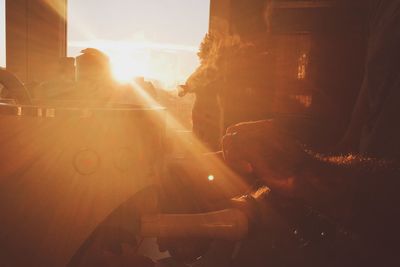 Man in city at sunset