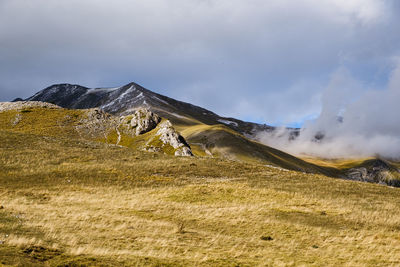 Scenic view of landscape against sky in arquata del tronto, marche italy 