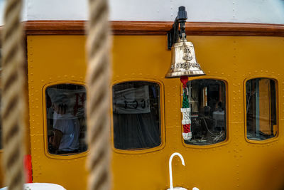 Close-up of yellow train window