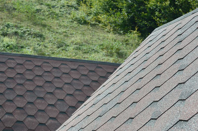 High angle view of roof tiles by building