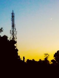 Low angle view of silhouette trees against sky during sunset