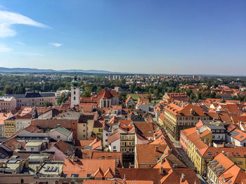 High angle view of townscape against blue sky