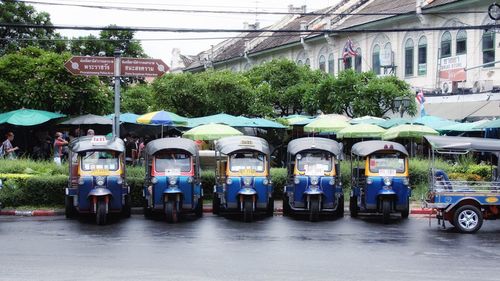 Jinrikishas parked on street