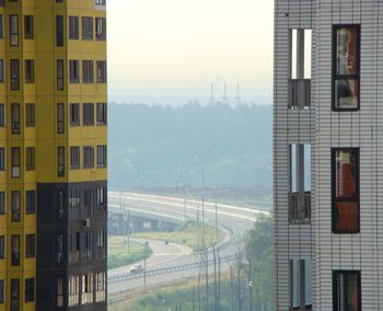 Buildings in city against sky
