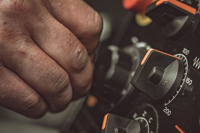 Close-up of person holding camera