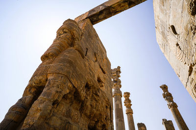 Low angle view of old temple against sky at persepolis