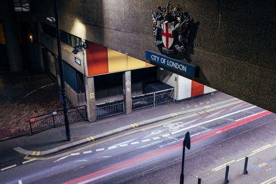 High angle view of light trails on road in city