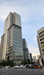 Low angle view of skyscrapers against sky